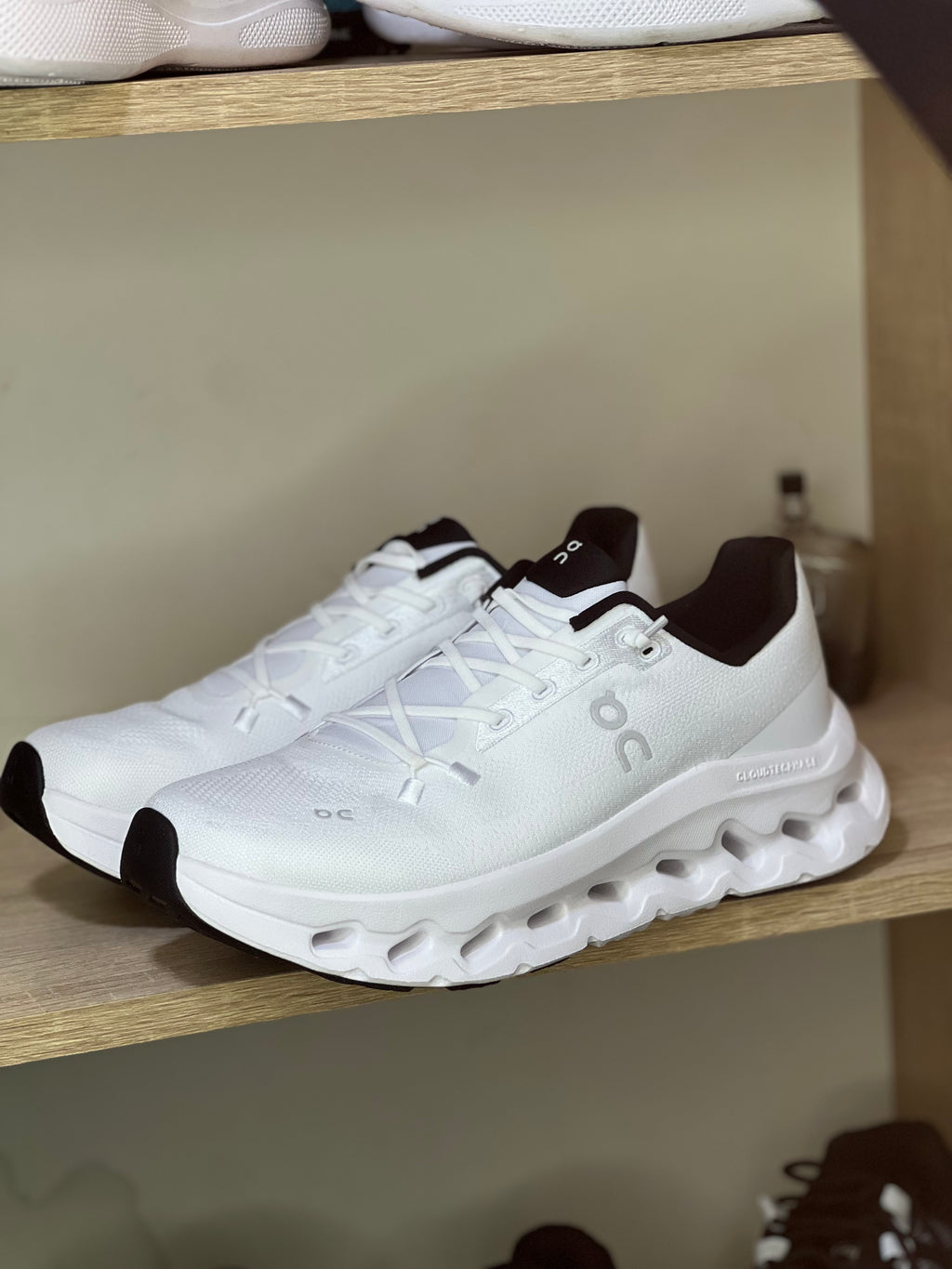 On cloud tilt white black